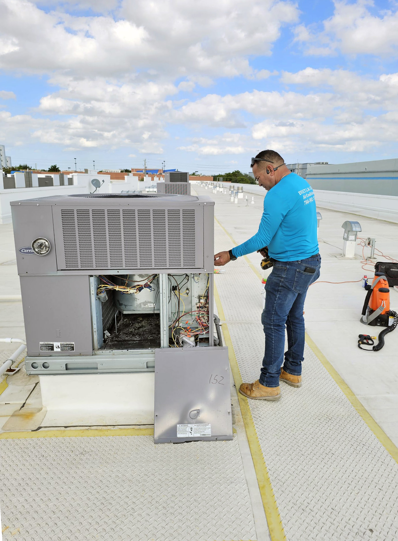 Duct LM Corp repairing, installing and providing maintenance to air conditioners.